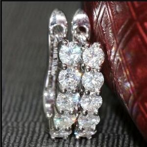 The Timeless Classic Brilliant mini hoop earrings in silver